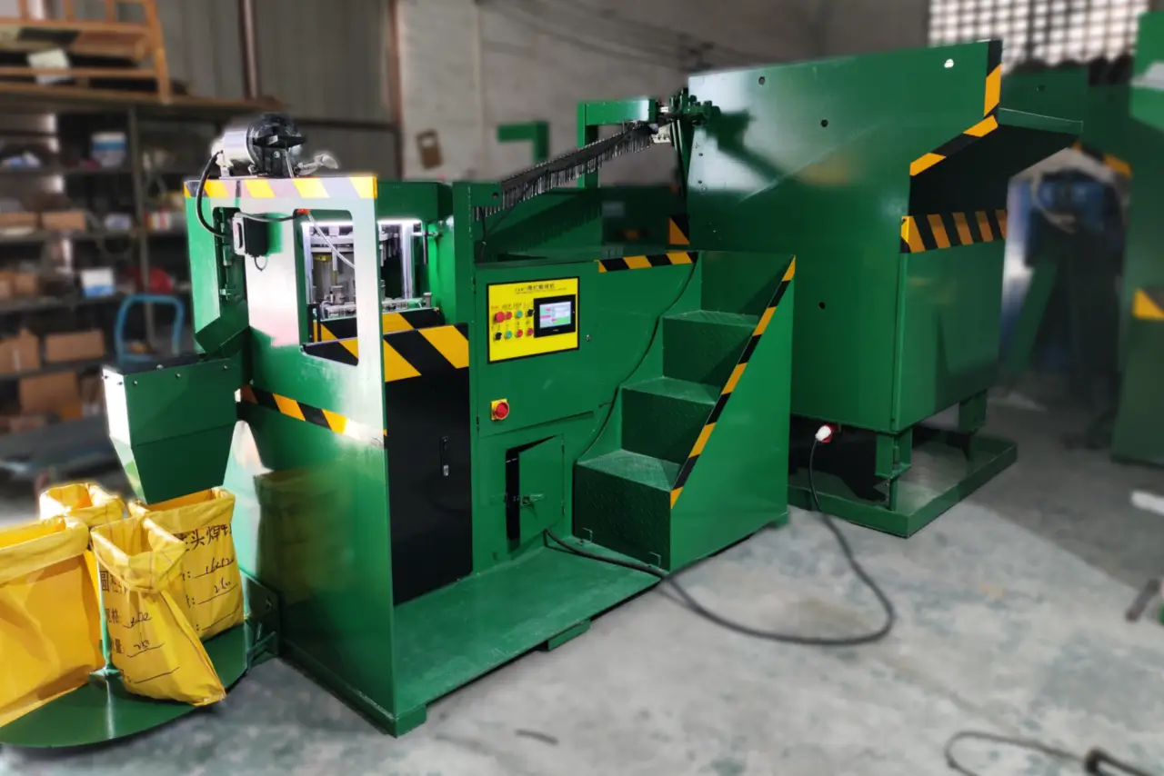 Flux Ball Fixing Machine full view, showing industrial hydraulic system and stud feeding components