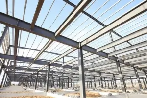 Heavy-duty structural steel frame construction using drawn arc weld studs for composite beam connections.